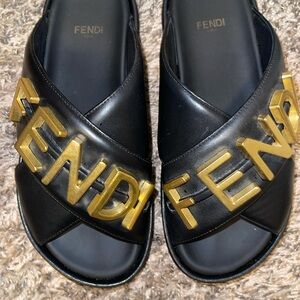 Fendi Black Leather Slide Sandals with Gold Lettering